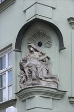 Sculpture of the Pieta on a corner house