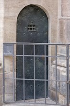 Sacristy door with peep window