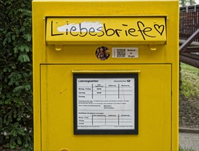 German Post Office letterbox with graffiti love letters