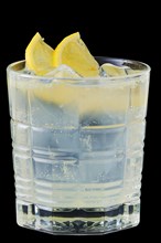 Summer refreshing lemon spritz cold cocktail isolated on black