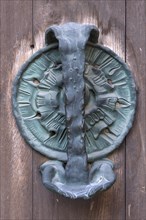 Right bronze fitting on the door of the Tugendbrunnenpotrtal
