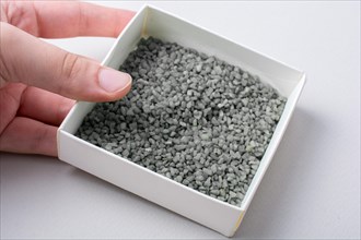 Little green color sand in box as a background texture