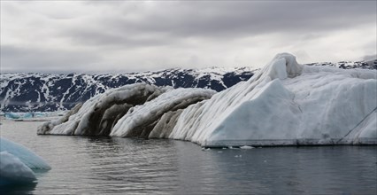Icebergs in summer on the coast of Disko Bay near Ilulissat