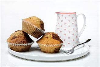 Chocolate muffins with milk cane