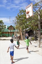 Boys playing basketball