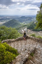 Hiker on the trail to Castell d Alaro