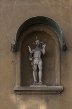 Christ figure in a niche on the residential house in the Jakob Fugger Siedlung