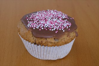 Homemade muffin with colourful sprinkles