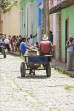 Old colorful horse and donkey carts in the streets of Havana