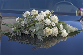 Bridal bouquet on a bonnet