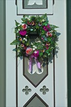Flower arrangement on a door in Friedrichstadt