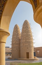 View of Pigeon Towers through the arcade arch of mosque