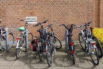 Bicycles parked in front of the district hall