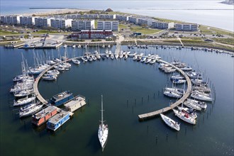 Aerial view over sailing boats docked in the Burgtiefe marina at on Fehmarn
