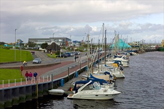 Bensersiel harbour with the North Sea spa in the background