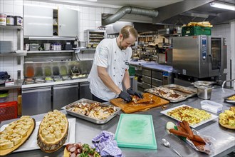Chef during the preparation of dishes