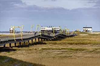 Pier to the typical pile dwellings of Sankt Peter-Ording
