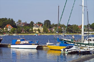 Sports boat harbour with a view of the Borby district
