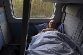 Man in the couchette car of the HZ Croatian Railway