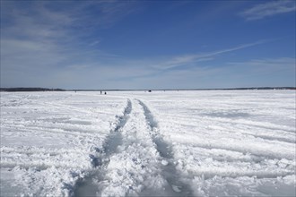 Vehicle tracks on ice and snow