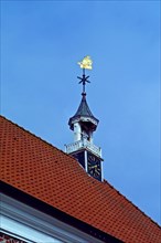 Church tower with weather vane