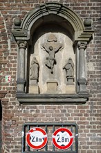 Religious relief on the cow gate of the city of Kempen