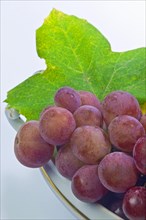 Grapes in an old porcelain bowl