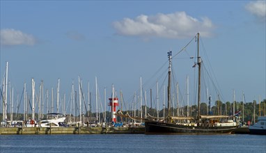 Sports boat harbour with gaff schooner Marie Galante