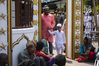Indian Muslims returns after perform the second Friday prayer in the holy month of Ramadan at a Mosque in Guwahati