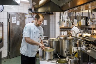 Chef during the preparation of dishes