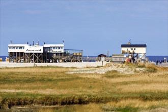 Sankt Peter-Ording beach with the typical pile dwellings