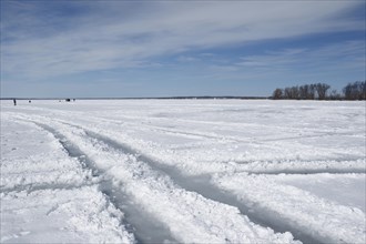 Vehicle tracks on ice and snow