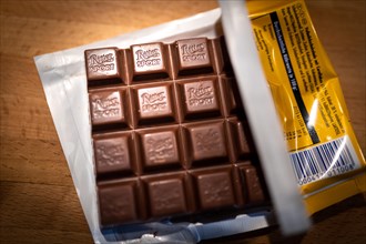 Ritter Sport chocolate lies unwrapped in a package on a kitchen worktop in Berlin