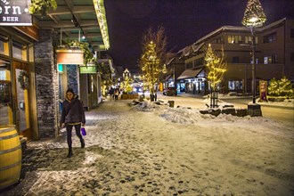 Winter street with Christmas decorations in Banff