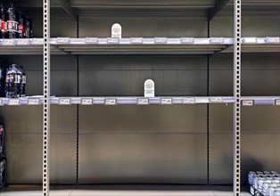 Empty shelves in supermarket