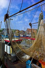 Net on crab cutter in the harbour of Neuharlingersiel