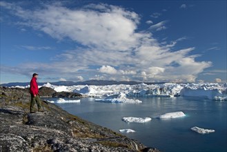 Tourist looking at Kangia Icefjord