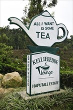 Road sign with teapot