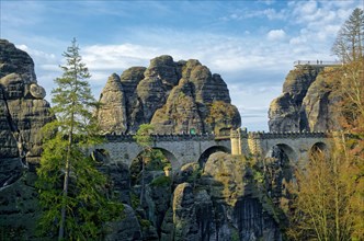 View from the rock castle Neurathen to the Bastei bridge and the new Bastei view