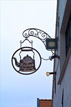 Advertising sign of a tea room in Greetsiel