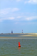 Fairway buoy in front of the island of Wangerooge