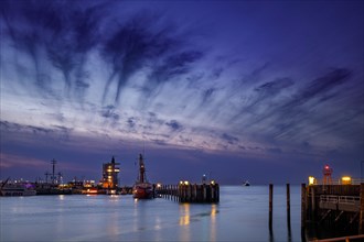 Harbour entrance in Cuxhaven at the mouth of the Elbe at night