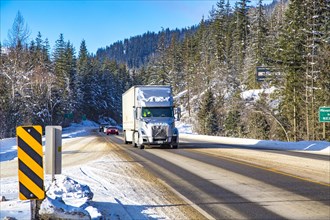 Truck on the wintry Trans Canada Highway near Revelstoke