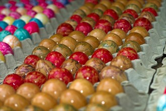 Colourful painted chicken eggs as Easter decoration