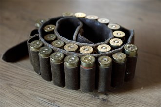 Cartridge belt with shotgun ammunition calibre 12