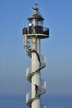 The Alprech lighthouse with spiralling exterior staircase near Le Portel