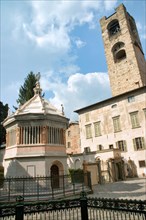 The octagonal baptistery and the big clock tower in Piazza del Duomo in Bergamo alta