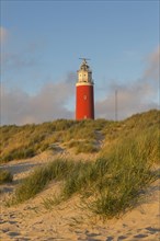 Eierland Lighthouse in the dunes on the northernmost tip of the Dutch island of Texel
