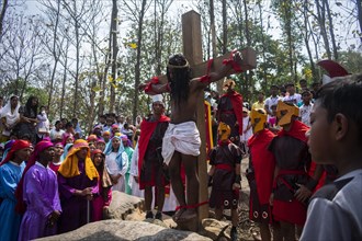 Christian devotees during the annual Good Friday procession to re-enact the crucifixion of Jesus Christ on April 7
