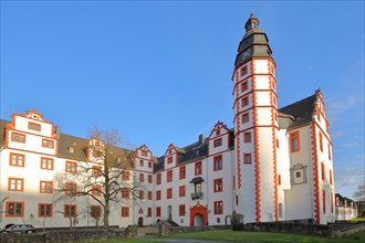 Inner courtyard of Renaissance castle with tower as landmark